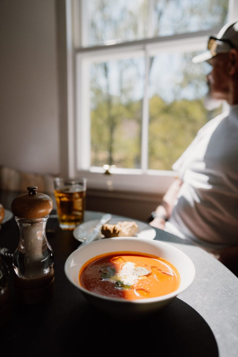 Bowl of soup beside the window at Cairn Valley Cottage, Rothiemurchus, Aviemore