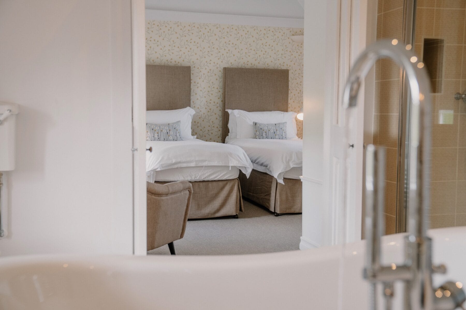 Twin bedroom with garden views at Achnahatnich House, Rothiemurchus, Aviemore